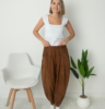 Cómo llevar babuchas en otoño 2026: los looks en tonos ámbar que son tendencia